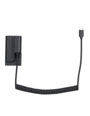 USB-C PD to NP-F dummy battery coiled power cable full length view showing spring cable design and Type-C connector